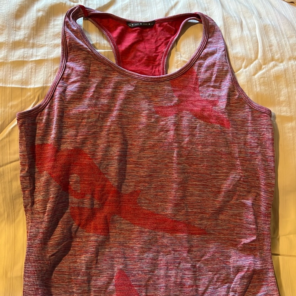 Oiselle pink tank top. Stretchy in excellent condition.